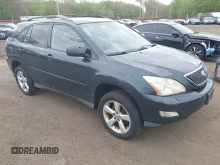 2006 Lexus RX 330 with VIN 2T2HA31U56C090677, listed as a IAAI auction lot 42182540 with 216,676 mi miles. Bid and sale history available at carsss.com. Image 1.