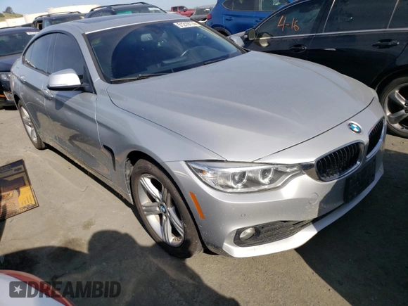 2015 BMW 4 Series 428i xDrive with VIN WBA4C9C52FG135501, listed as a Copart auction lot 51219774 with 104,333 mi miles and Salvage Title. Bid and sale history available at DreamBid. Image 4.