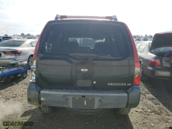 2001 Nissan Xterra XE with VIN 5N1ED28T11C565485, listed as a Copart auction lot 87490404 with 238,044 mi miles and Salvage Title. Bid and sale history available at carsss.com. Image 6.