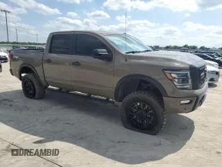 2021 Nissan Titan Pro-4X с VIN 1N6AA1ED5MN523913, выставлен на аукционе Copart как лот 56371695 с пробегом 36 785 миль миль и Списание • Salvage title. История ставок и продаж доступна на DreamBid. Изображение 4.