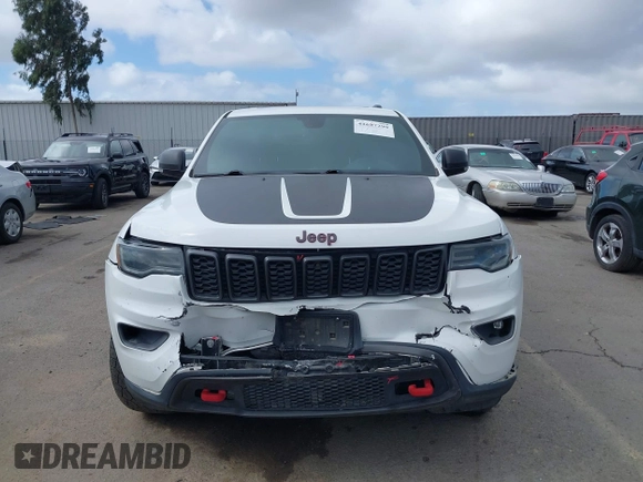 2018 Jeep Grand Cherokee Trailhawk with VIN 1C4RJFLT2JC137793, listed as a IAAI auction lot 41697299 with 149,100 mi miles and . Bid and sale history available at DreamBid. Image 6.