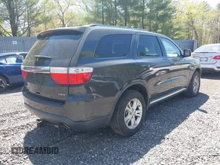 2011 Dodge Durango Crew with VIN 1D4SE4GT6BC664597, listed as a IAAI auction lot 42142568 with 202,275 mi miles and . Bid and sale history available at carsss.com. Image 4.