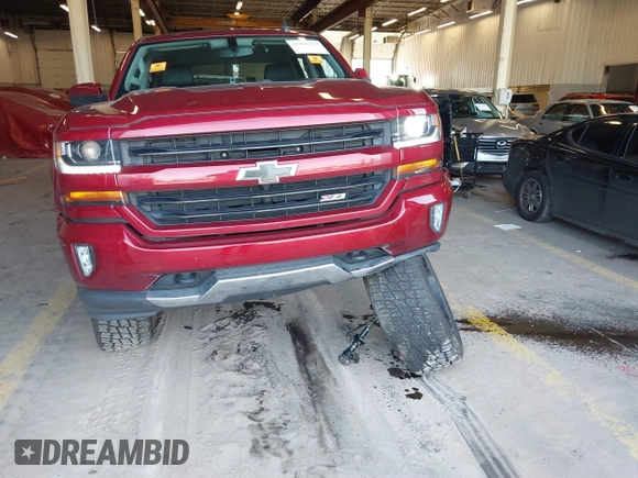 2018 Chevrolet Silverado 1500 LT with VIN 3GCUKREC0JG580317, listed as a IAAI auction lot 41868522 with 75,738 mi miles. Bid and sale history available at carsss.com. Image 17.