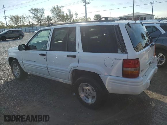 1998 Jeep Grand Cherokee Laredo with VIN 1J4GZ48Y9WC203024, listed as a Copart auction lot 83813114 with 105,044 mi miles and Non Repairable. Bid and sale history available at carsss.com. Image 2.