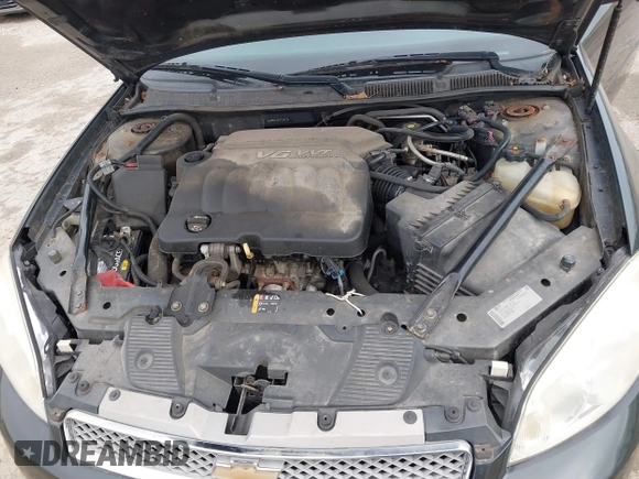2014 Chevrolet Impala LS with VIN 2G1WA5E30E1125611, listed as a IAAI auction lot 41828292 with 141,826 mi miles and . Bid and sale history available at DreamBid. Image 10.