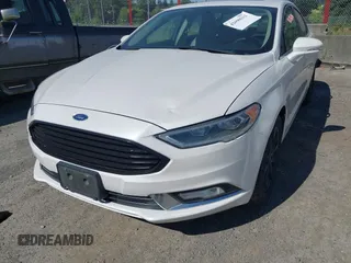 2017 Ford Fusion SE z VIN 3FA6P0HD3HR132779, wystawiony jako IAAI lot #42690212 z przebiegiem 165 293 mil mil oraz . Historia ofert i sprzedaży dostępna na DreamBid. Obrazek 6.