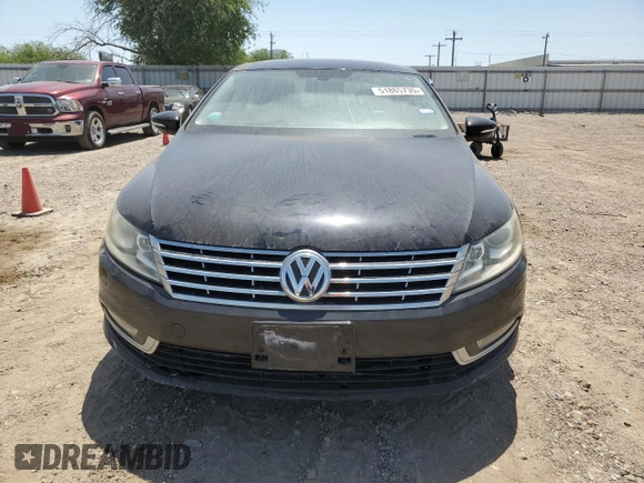 2013 Volkswagen CC R-Line z VIN WVWBN7AN3DE512289, wystawiony jako Copart lot #51865735 z przebiegiem 69 799 mil mil oraz Szkoda całkowita • Salvage title. Historia ofert i sprzedaży dostępna na DreamBid. Obrazek 5.