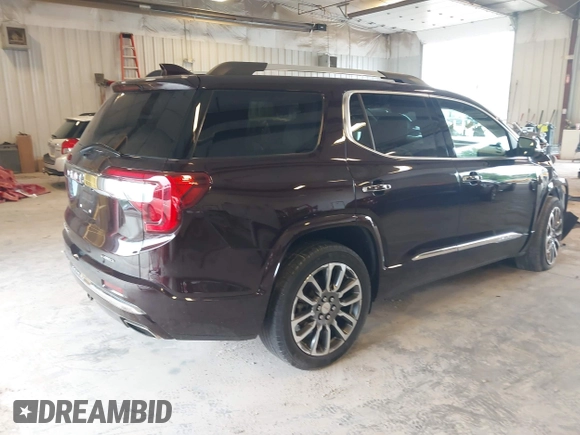 2021 GMC Acadia Denali with VIN 1GKKNXLS2MZ140119, listed as a IAAI auction lot 42553557 with 50,197 mi miles and . Bid and sale history available at DreamBid. Image 4.