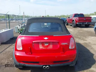 2006 MINI Convertible S with VIN WMWRH33596TK58563, listed as a IAAI auction lot 42210790 with 102,476 mi miles and . Bid and sale history available at DreamBid. Image 16.