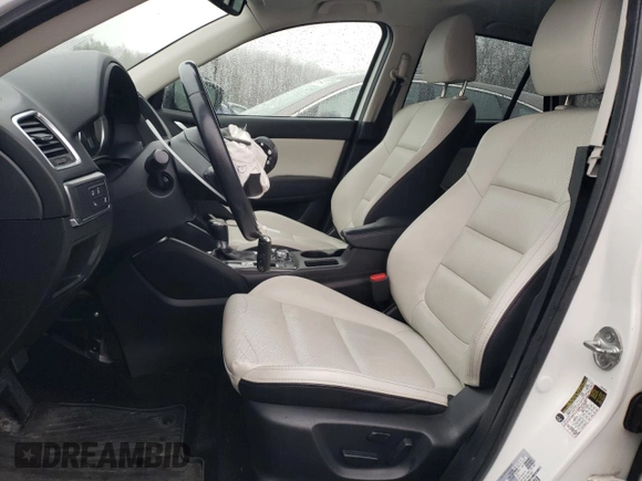 2016 Mazda CX-5 Grand Touring with VIN JM3KE4DY8G0728765, listed as a Copart auction lot 51625825 with 141,681 mi miles and Salvage Title. Bid and sale history available at carsss.com. Image 7.