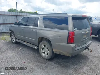 2017 Chevrolet Suburban LT with VIN 1GNSKHKC7HR356677, listed as a IAAI auction lot 42491581 with 129,496 mi miles and . Bid and sale history available at DreamBid. Image 3.