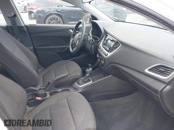 2022 Hyundai Accent SE with VIN 3KPC24A67NE177354, listed as a IAAI auction lot 42255732 with 30,969 mi miles and . Bid and sale history available at DreamBid. Image 5.