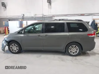2011 Toyota Sienna XLE AAS with VIN 5TDYK3DC8BS111639, listed as a IAAI auction lot 42108488 with 300,872 mi miles and . Bid and sale history available at DreamBid. Image 14.