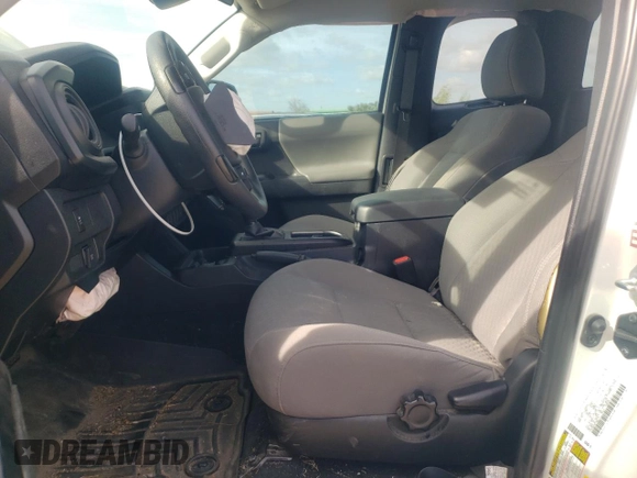 2023 Toyota Tacoma SR with VIN 3TYRX5GN2PT083718, listed as a Copart auction lot 49546035 with 23,005 mi miles and Salvage title. Bid and sale history available at DreamBid. Image 7.