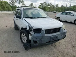 2006 Ford Escape XLT with VIN 1FMYU03146KC34615, listed as a Copart auction lot 55096195 with 144,398 mi miles and Salvage Title. Bid and sale history available at DreamBid. Image 14.