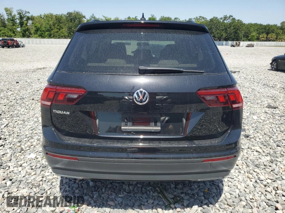 2021 Volkswagen Tiguan S z VIN 3VV1B7AX2MM020872, wystawiony jako Copart lot #57106925 z przebiegiem 92 908 mil mil oraz Czysty tytuł • Clean title. Historia ofert i sprzedaży dostępna na DreamBid. Obrazek 6.