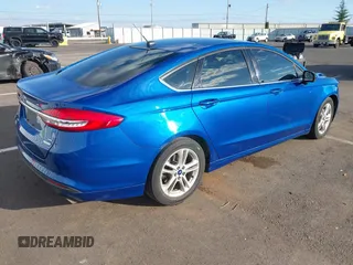 2018 Ford Fusion SE with VIN 3FA6P0HDXJR168152, listed as a IAAI auction lot 41740165 with 129,636 mi miles. Bid and sale history available at carsss.com. Image 4.