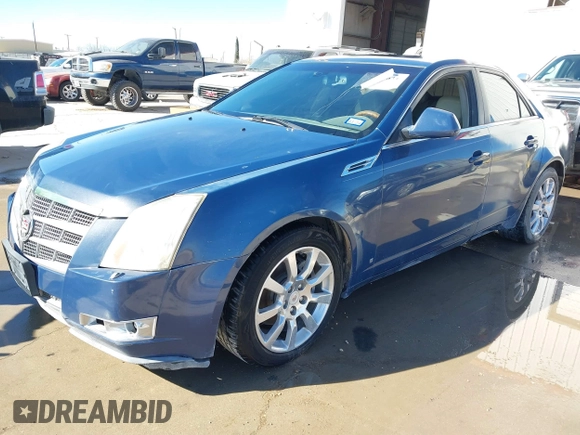 2009 Cadillac CTS RWD with VIN 1G6DV57V990146995, listed as a IAAI auction lot 41209631 with 172,229 mi miles and . Bid and sale history available at carsss.com. Image 2.