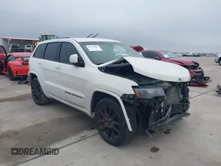 2018 Jeep Grand Cherokee Laredo E with VIN 1C4RJEAG0JC218694, listed as a IAAI auction lot 41587665 with 97,618 mi miles. Bid and sale history available at carsss.com. Image 1.