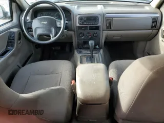 2003 Jeep Grand Cherokee Laredo with VIN 1J4GX48S83C536747, listed as a Copart auction lot 84250534 with 162,649 mi miles and Salvage Title. Bid and sale history available at carsss.com. Image 8.