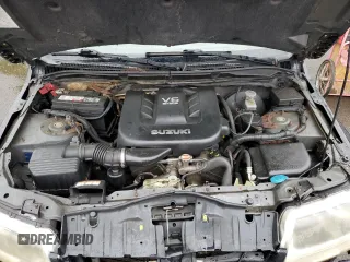 2006 Suzuki Grand Vitara Luxury with VIN JS3TD947364101307, listed as a Copart auction lot 55037585 with 198,616 mi miles and Salvage title. Bid and sale history available at DreamBid. Image 12.