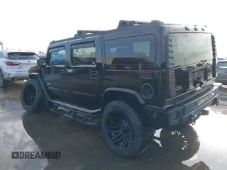 2003 Hummer H2 z VIN 5GRGN23UX3H112173, wystawiony jako IAAI lot #41093359 z przebiegiem Nie podano mil oraz . Historia ofert i sprzedaży dostępna na DreamBid. Obrazek 3.