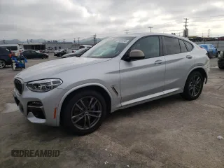 2020 BMW X4 M40i z VIN 5UX2V5C02L9B14571, wystawiony jako Copart lot #44318703 z przebiegiem 14 861 mil mil oraz . Historia ofert i sprzedaży dostępna na DreamBid. Obrazek 1.