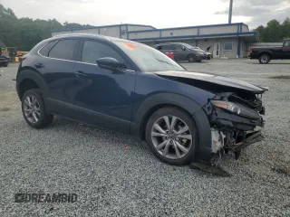 2022 Mazda CX-30 S Premium with VIN 3MVDMBDLXNM416419, listed as a Copart auction lot 54128265 with 54,838 mi miles and Salvage title. Bid and sale history available at DreamBid. Image 4.