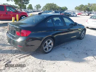 2013 BMW 3 Series 328i with VIN WBA3A5C53DF351970, listed as a IAAI auction lot 42142508 with 174,265 mi miles. Bid and sale history available at carsss.com. Image 4.