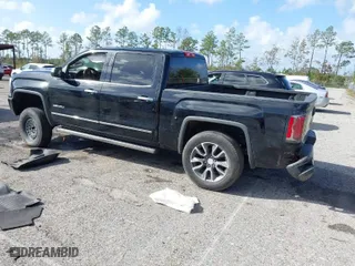 2017 GMC Sierra 1500 Denali with VIN 3GTU2PEJ7HG309560, listed as a IAAI auction lot 40764302 with 154,061 mi miles. Bid and sale history available at carsss.com. Image 3.