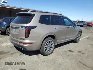 2023 Cadillac XT6 AWD Sport z VIN 1GYKPHRSXPZ181132, wystawiony jako Copart lot #50512825 z przebiegiem 17 302 mil mil oraz Szkody całkowita. Historia ofert i sprzedaży dostępna na DreamBid. Obrazek 3.