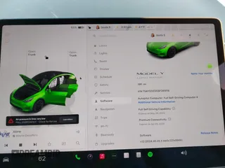 2025 Tesla Model Y Long Range with VIN 7SAYGDED5SF281818, listed as a IAAI auction lot 41302611 with 395 mi miles and . Bid and sale history available at DreamBid. Image 7.