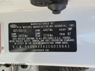 2012 Kia Optima EX with VIN 5XXGN4A62CG010641, listed as a Copart auction lot 69640744 with 150,145 mi miles and Clean Title. Bid and sale history available at carsss.com. Image 12.