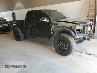 2010 GMC Canyon SLE1 with VIN 1GTJTCDE0A8101092, listed as a Copart auction lot 52311654 with 133,742 mi miles and Salvage title. Bid and sale history available at DreamBid. Image 4.
