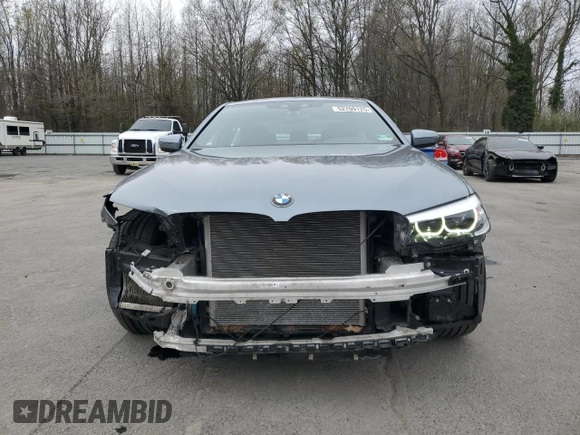 2019 BMW 5 Series 530e xDrive with VIN WBAJB1C56KB375312, listed as a Copart auction lot 52709125 with 63,422 mi miles and Salvage title. Bid and sale history available at DreamBid. Image 5.