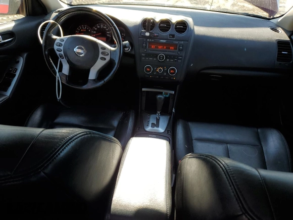 2009 Nissan Altima SL with VIN 1N4AL21E09N523784, listed as a Copart auction lot 53528935 with 168,675 mi miles and Salvage Title. Bid and sale history available at DreamBid. Image 8.
