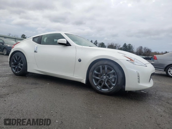 2015 Nissan 370Z with VIN JN1AZ4EH2FM440869, listed as a Copart auction lot 49371185 with 0 mi miles and Salvage Title. Bid and sale history available at carsss.com. Image 4.
