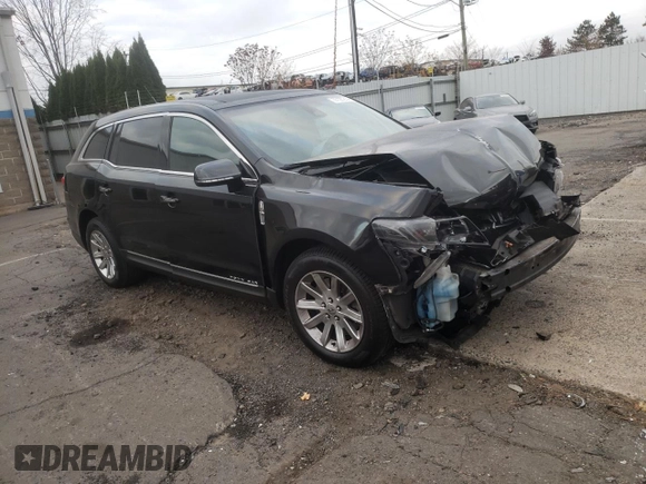 2019 Lincoln MKT with VIN 2LMHJ5NK3KBL04254, listed as a Copart auction lot 77127214 with Not Provided miles and Salvage Title. Bid and sale history available at DreamBid. Image 4.