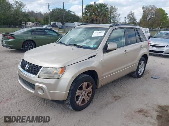 2008 Suzuki Grand Vitara Luxury z VIN JS3TD947384100130, wystawiony jako IAAI lot #41713955 z przebiegiem 180 631 mil mil oraz . Historia ofert i sprzedaży dostępna na DreamBid. Obrazek 2.