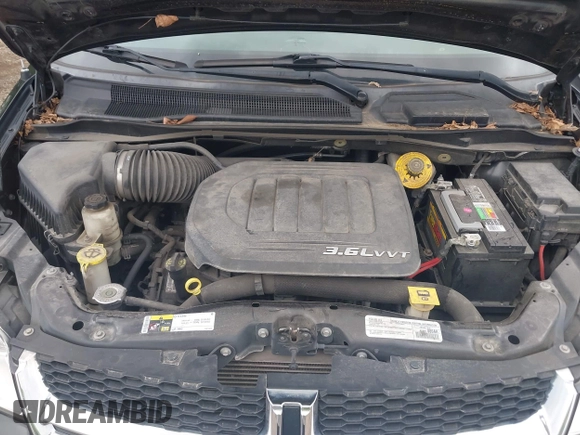 2017 Dodge Grand Caravan SXT with VIN 2C4RDGCG1HR773185, listed as a IAAI auction lot 42201139 with 166,718 mi miles and . Bid and sale history available at DreamBid. Image 10.