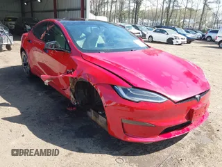 2021 Tesla Model S Long Range with VIN 5YJSA1E51MF436329, listed as a IAAI auction lot 41918018 with 44,029 mi miles and . Bid and sale history available at DreamBid. Image 1.
