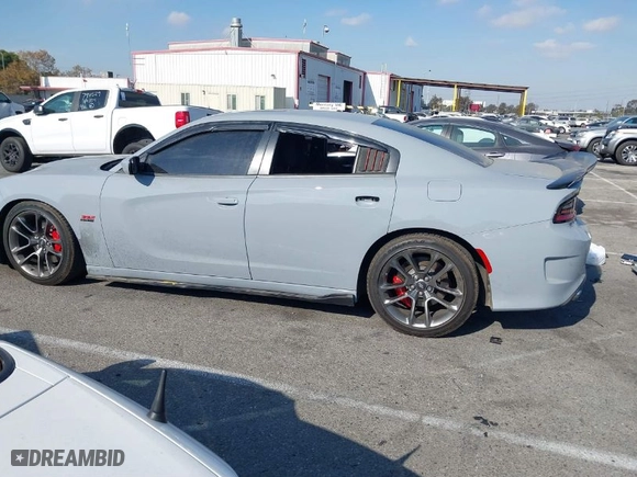 2022 Dodge Charger Scat Pack Widebody with VIN 2C3CDXGJ2NH166696, listed as a IAAI auction lot 40895426 with 34,004 mi miles. Bid and sale history available at carsss.com. Image 14.