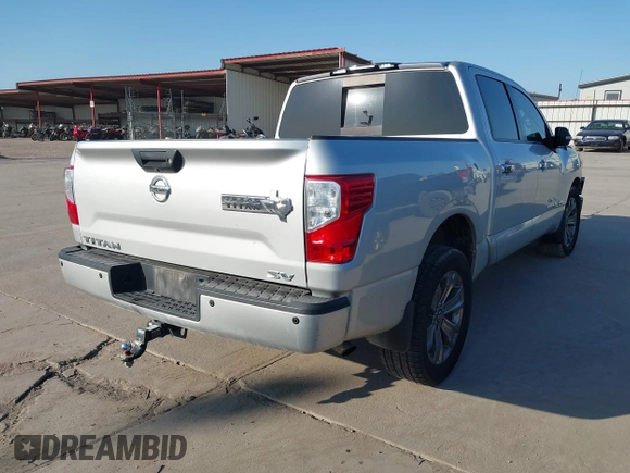 2018 Nissan Titan SV with VIN 1N6AA1E62JN502207, listed as a IAAI auction lot 41996558 with 133,051 mi miles and . Bid and sale history available at DreamBid. Image 4.