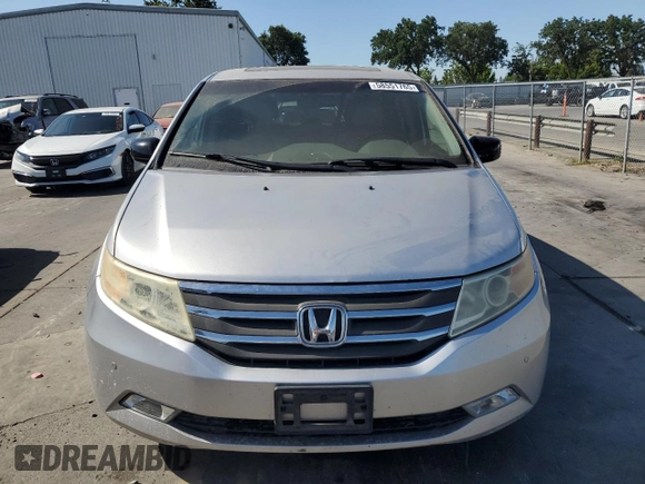 2011 Honda Odyssey Touring с VIN 5FNRL5H92BB063040, выставлен на аукционе Copart как лот 58551765 с пробегом 236 526 миль миль и Списание • Salvage title. История ставок и продаж доступна на DreamBid. Изображение 5.