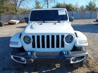 2023 Jeep Wrangler 4xe Sahara with VIN 1C4JJXP61PW684682, listed as a IAAI auction lot 40998281 with 41,138 mi miles. Bid and sale history available at carsss.com. Image 12.
