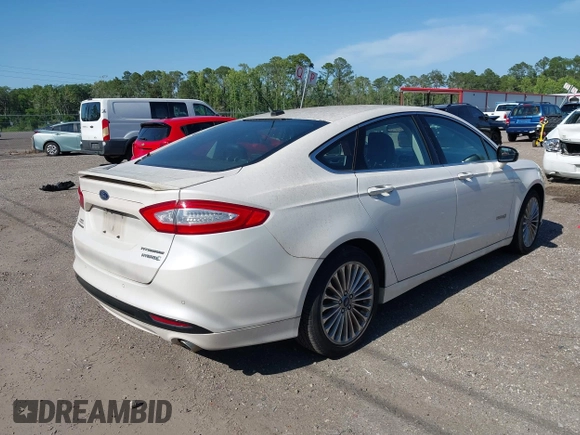 2014 Ford Fusion Titanium Hybrid with VIN 3FA6P0RU3ER279212, listed as a IAAI auction lot 42241465 with 155,841 mi miles and . Bid and sale history available at DreamBid. Image 4.