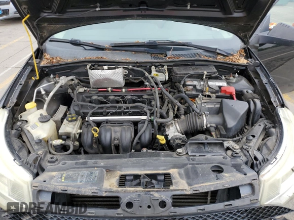 2009 Ford Focus SE z VIN 1FAHP35N69W138629, wystawiony jako Copart lot #58012605 z przebiegiem 155 557 mil mil oraz Szkoda całkowita • Salvage title. Historia ofert i sprzedaży dostępna na DreamBid. Obrazek 11.