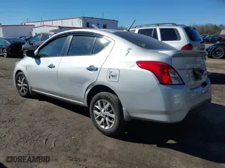2019 Nissan Versa Sedan SV with VIN 3N1CN7AP2KL818910, listed as a IAAI auction lot 41542379 with 64,626 mi miles. Bid and sale history available at carsss.com. Image 3.