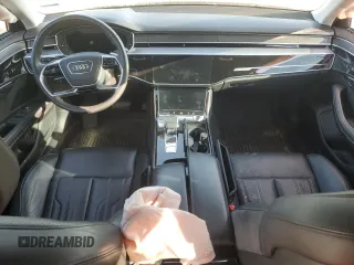 2021 Audi A8 z VIN WAU8DAF82MN007466, wystawiony jako Copart lot #52255715 z przebiegiem Nie podano mil oraz Szkoda całkowita • Salvage title. Historia ofert i sprzedaży dostępna na DreamBid. Obrazek 8.