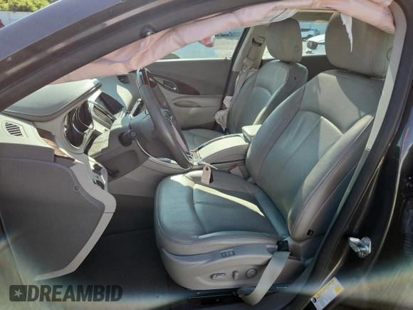 2013 Buick LaCrosse Touring с VIN 1G4GJ5E32DF245263, выставлен на аукционе Copart как лот 61476805 с пробегом 38 048 миль миль и Списание • Salvage title. История ставок и продаж доступна на DreamBid. Изображение 7.
